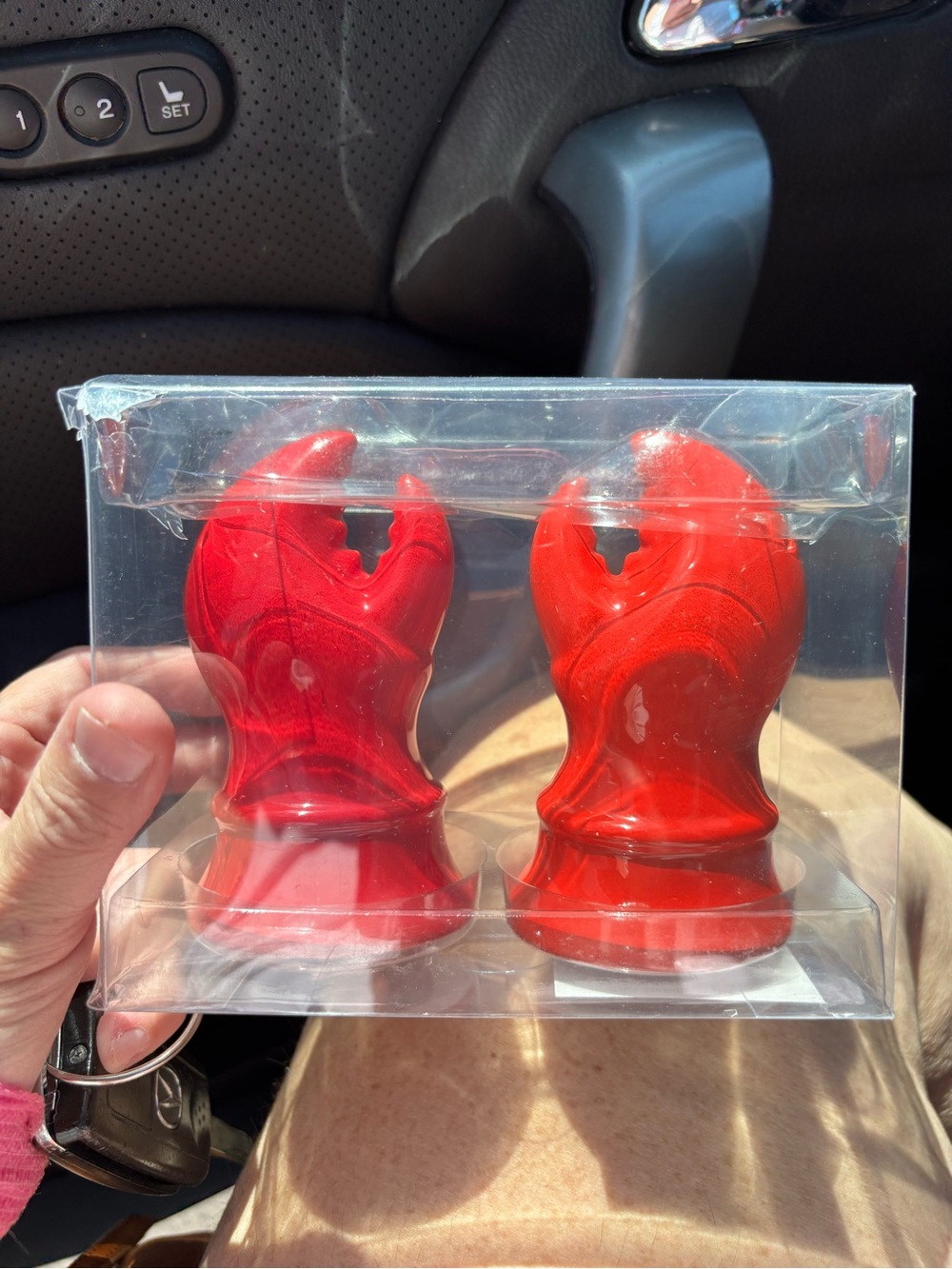 Lobster salt and pepper shakers and a lobster bottle opener
